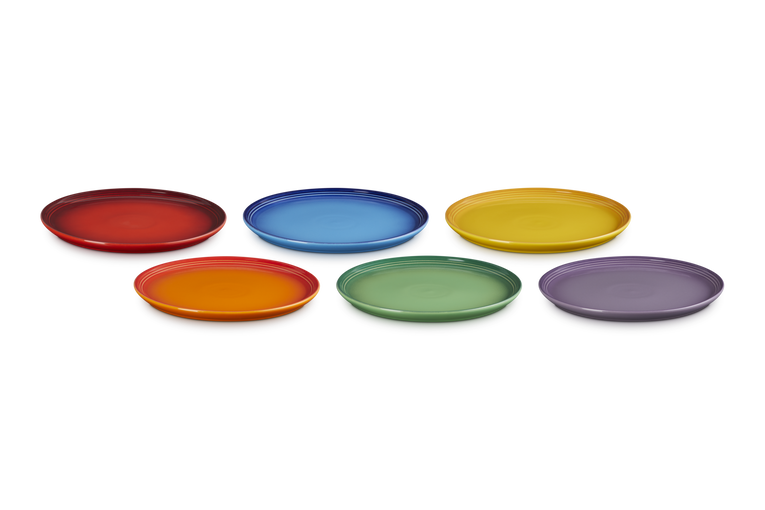 Set of six colorful plates on a white background