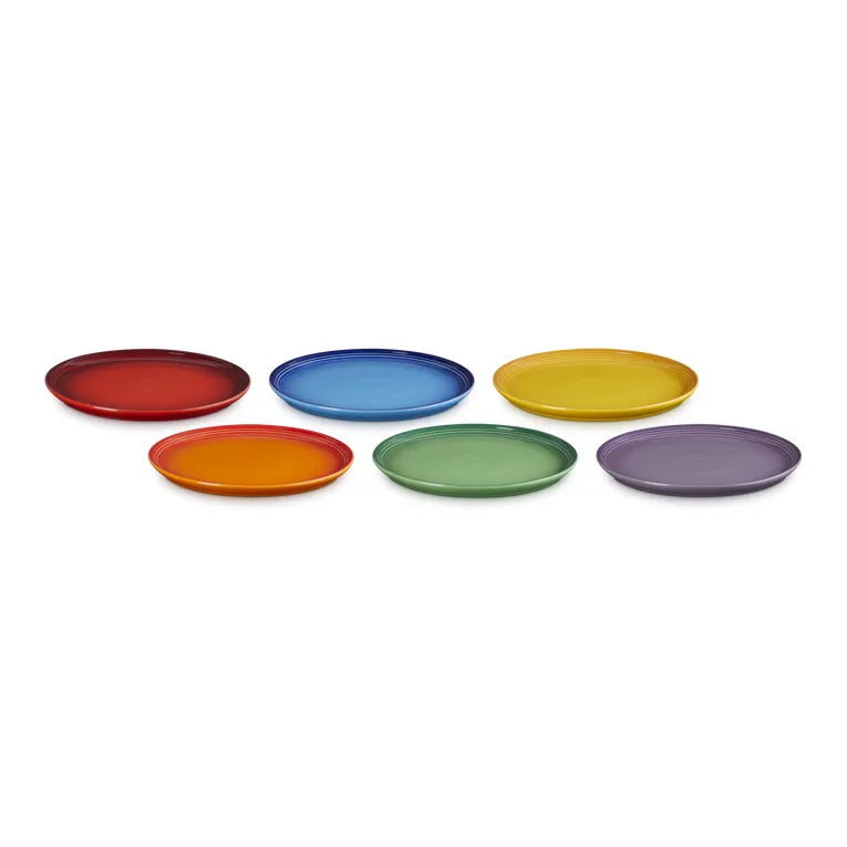 Set of six colorful plates on a white background