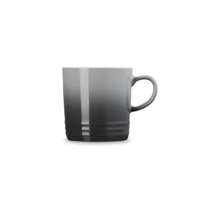 Gray mug with a gradient design on a white background