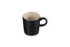 Black mug with beige interior on a white background