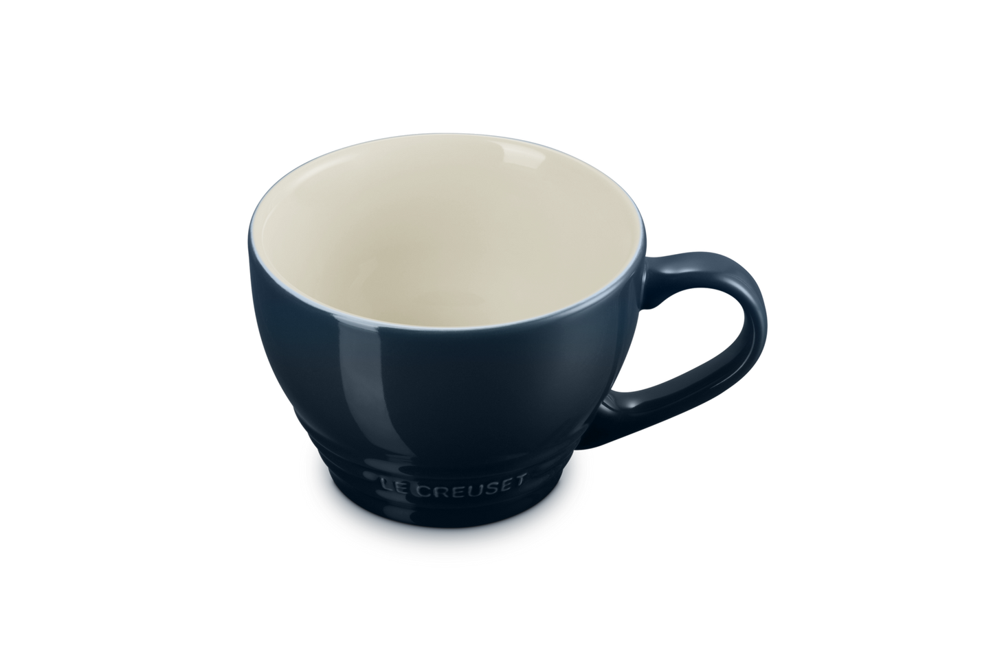 Blue mug with a beige interior on a white background