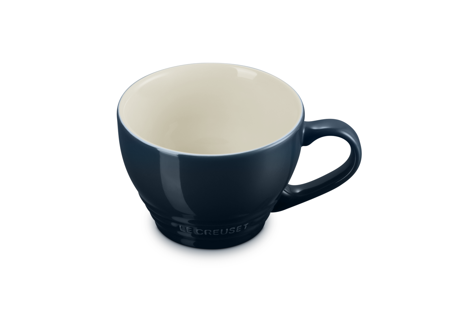 Blue mug with a beige interior on a white background